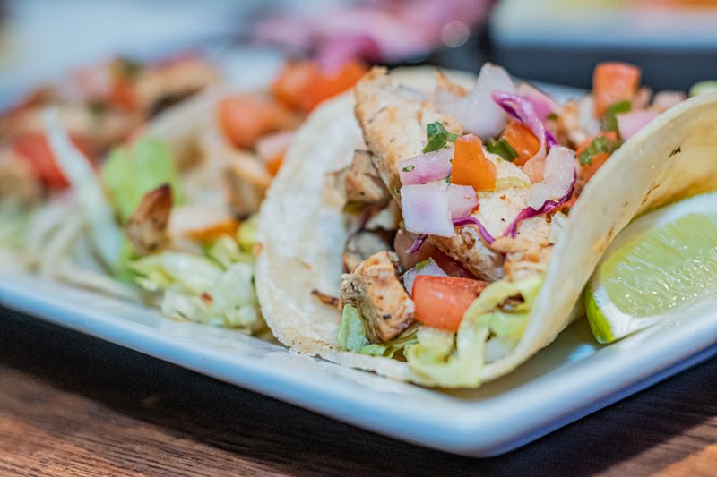 Chuys sizzling chicken fajitas on cast iron skillet